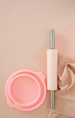 pink confectionery on a pink background. silicone roll, pad, forms