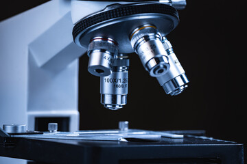professional scientific equipment microscope for medicine scientist using in biotechnology science laboratory, biology or chemistry and medical technology research with microbiology experiment
