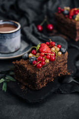 Delicious chocolate cake decorated with fresh berries