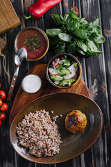 buckwheat with cutlet, borscht and salad