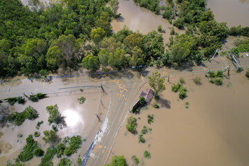 High-angle view of the Great Flood, Meng District, Thailand, on October 3, 2022, is a photograph from real flooding. With a slight color adjustment
