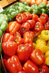 Yellow orange and red capsicum on white background 