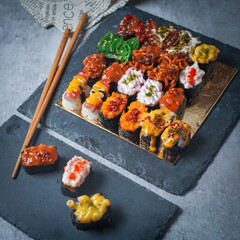 Sushi is a Japanese dish of prepared vinegared rice (鮨飯, sushi-meshi), usually with some sugar and salt, accompanied by a variety of ingredients