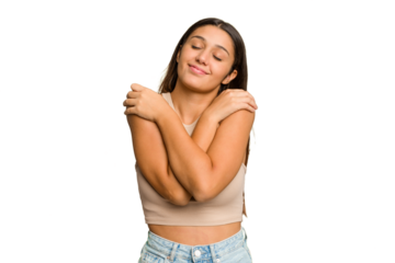 Young Indian woman isolated cutout removal background hugs, smiling carefree and happy.