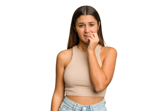 Young Indian woman isolated cutout removal background biting fingernails, nervous and very anxious.