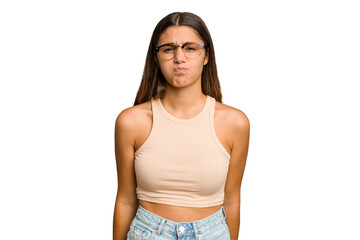 Young Indian woman isolated cutout removal background blows cheeks, has tired expression. Facial expression concept.