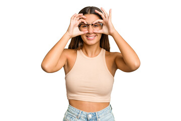 Obraz premium Young Indian woman isolated cutout removal background showing okay sign over eyes