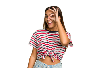 Young Indian woman isolated cutout removal background excited keeping ok gesture on eye.