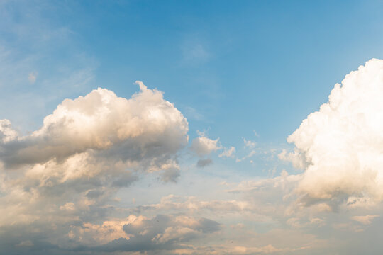 Blue sky background with clouds © Anthony Paz