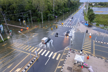 flooding the road until the car can't go., Meng District, Ubon Ratchathani Province, Thailand, on...