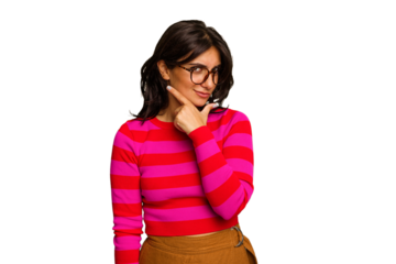 Young Indian woman isolated on green chroma background contemplating, planning a strategy, thinking about the way of a business.