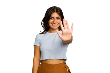 Young Indian woman isolated on green chroma background smiling cheerful showing number five with fingers.