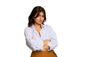 Young Indian woman isolated on green chroma background unhappy looking in camera with sarcastic expression.