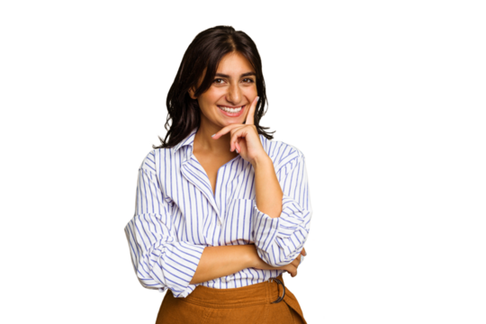 Young Indian woman isolated on green chroma background smiling happy and confident, touching chin with hand.
