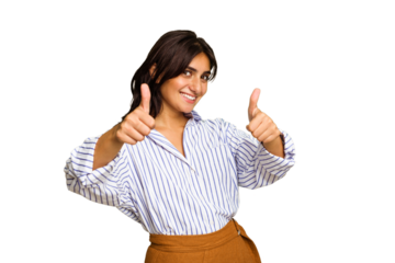 Young Indian woman isolated on green chroma background raising both thumbs up, smiling and confident.