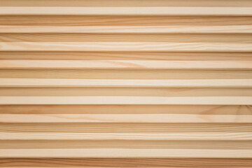 Wooden panel made of light nasturalny material. A wall of timber slats