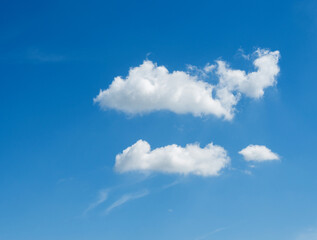 Two clouds on blue sky