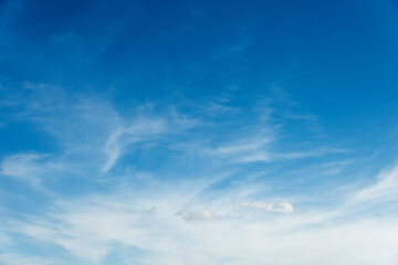 Soft white clouds against blue sky
