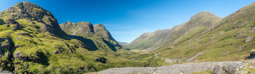 Fototapeta na wymiar A panorama of the three sisters of Glencoe and surrounding valley
