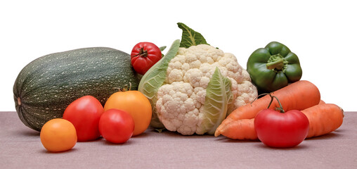 Still life from the harvest of fresh raw vegetables from the farm red and yellow tomatoes, bell peppers, cauliflower, squash, carrots