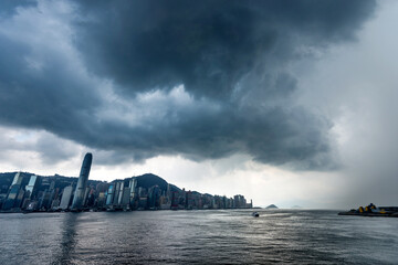 Hong Kong downtown with dark clouds in storm