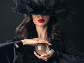 Halloween witch woman with crystal ball