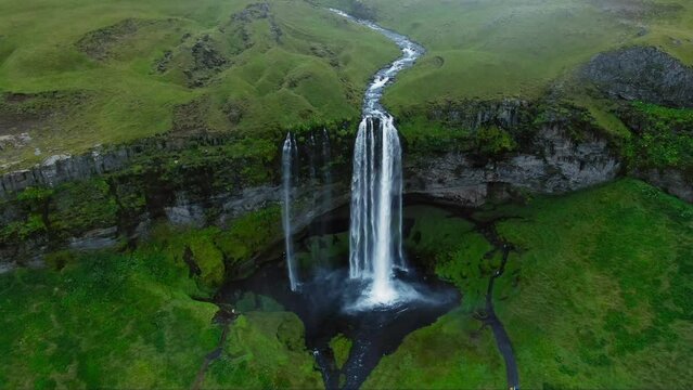 aerial view drone of Seljalandsfoss waterfall tourist attaction iceland landmark wide high shot