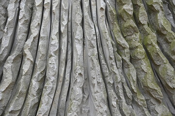 Oberflächenstruktur eines bearbeiteten Sandsteinblocks