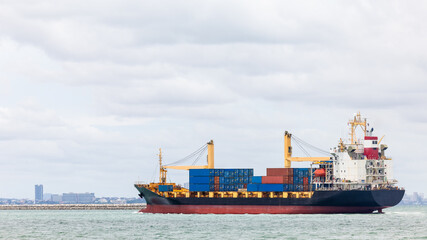 Container ship transporting cargo logistic to import export goods internationally around the world, including Asia Pacific and Europe, business and industry service of goods logistic transportation 