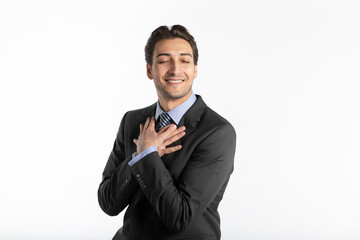 Handsome satisfied businessman in black suit isolated on white background