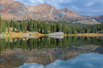 Beautiful Autumn Color in the Colorado Rocky Mountains. Ruby Peak and Mt. Owen with Lake Irwin,...