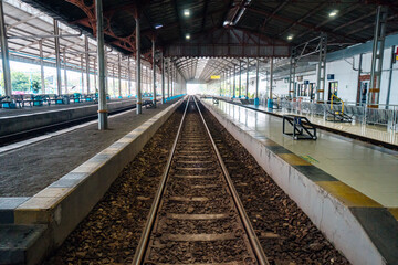 Train station which is still very empty of passengers due to the effects of the covid 19 pandemic, the station looks a little bit crowded at peak hour