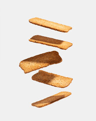 Levitating loaves on a gray background. Isolate..