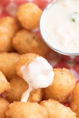 Sauce covered tater tot