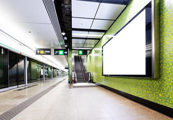 Blank billboard in subway station of city