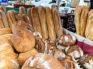 French bakery products, baguettes and bread on farmers market