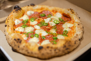 Jjust now cooked pizza from oven inside a pizza box ready for delivery recipe take-out meat hot eat take-away box