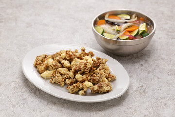 Tangsuyuk is a popular Korean Chinese dish known as Korean sweet and sour pork (separate dish version).