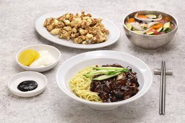 Jajangmyeon and Tangsuyuk are a popular Korean Chinese dish known as Korean black bean noodles and Korean sweet and sour pork (separate dish version).