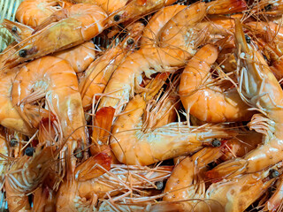 Fresh cooked shrimp on display at a market