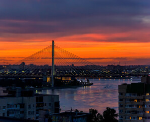 Fototapeta premium Bright summer sunset in the city taken from a tall building.