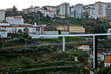 Covilha, Portugal, march 17 2014; General view from the side of Ribeira da Carpinteira crossed by...