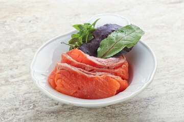 Sliced salmon fillet starter snack