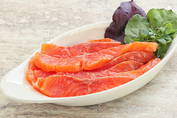 Sliced salmon fillet starter snack