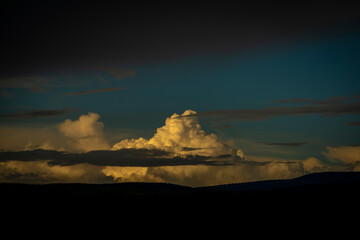 Big clouds before storm over Krkonose mountains in summer day