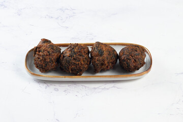 Indian spicy vegetable pakora or pakoda served in dish isolated on table top view