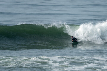 Bodyboarder riding a wave in Furadouro beach, Ovar,  Aveiro - Portugal.