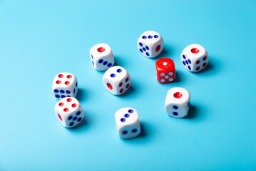 Game dice with copy space on a blue background. Concept for games, game board, presentation, banners or web. View from above. Close-up.