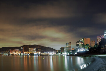 Fototapeta premium Alicante at night from Albufera beach.