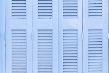 Window closed shutters background, texture. Traditional Greek island house.